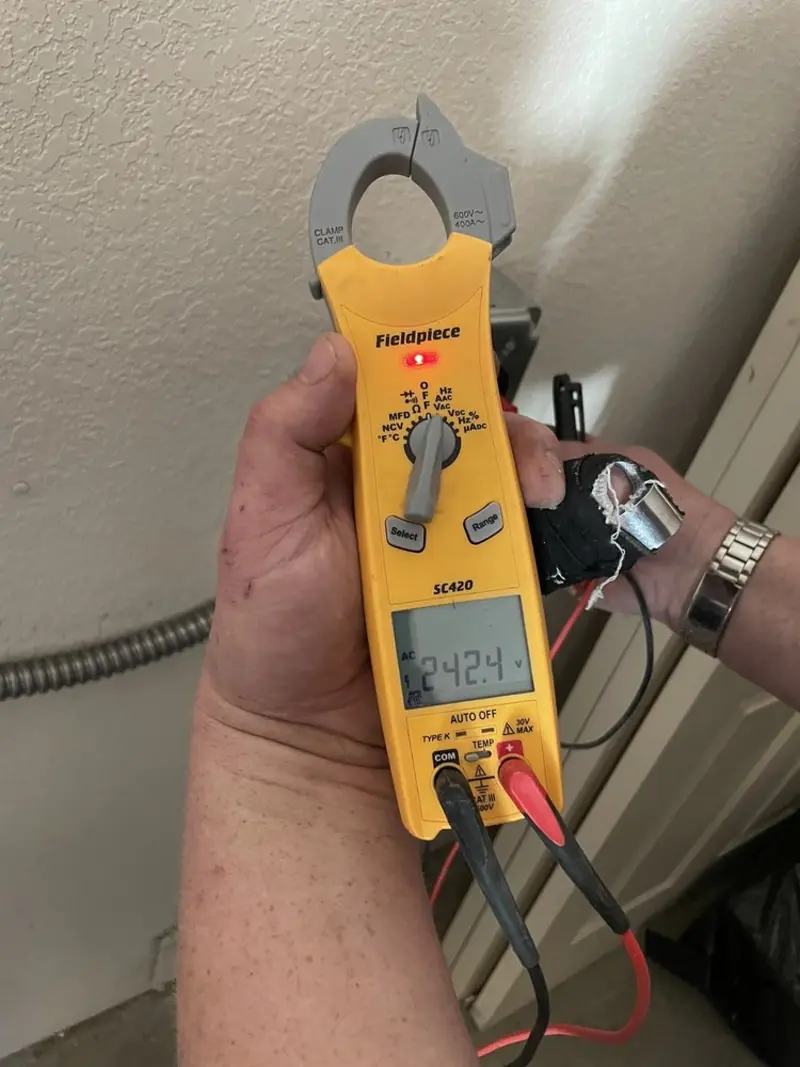 Voltage testing with clamp meter during Recessed Lighting Installation in Lake Cherokee